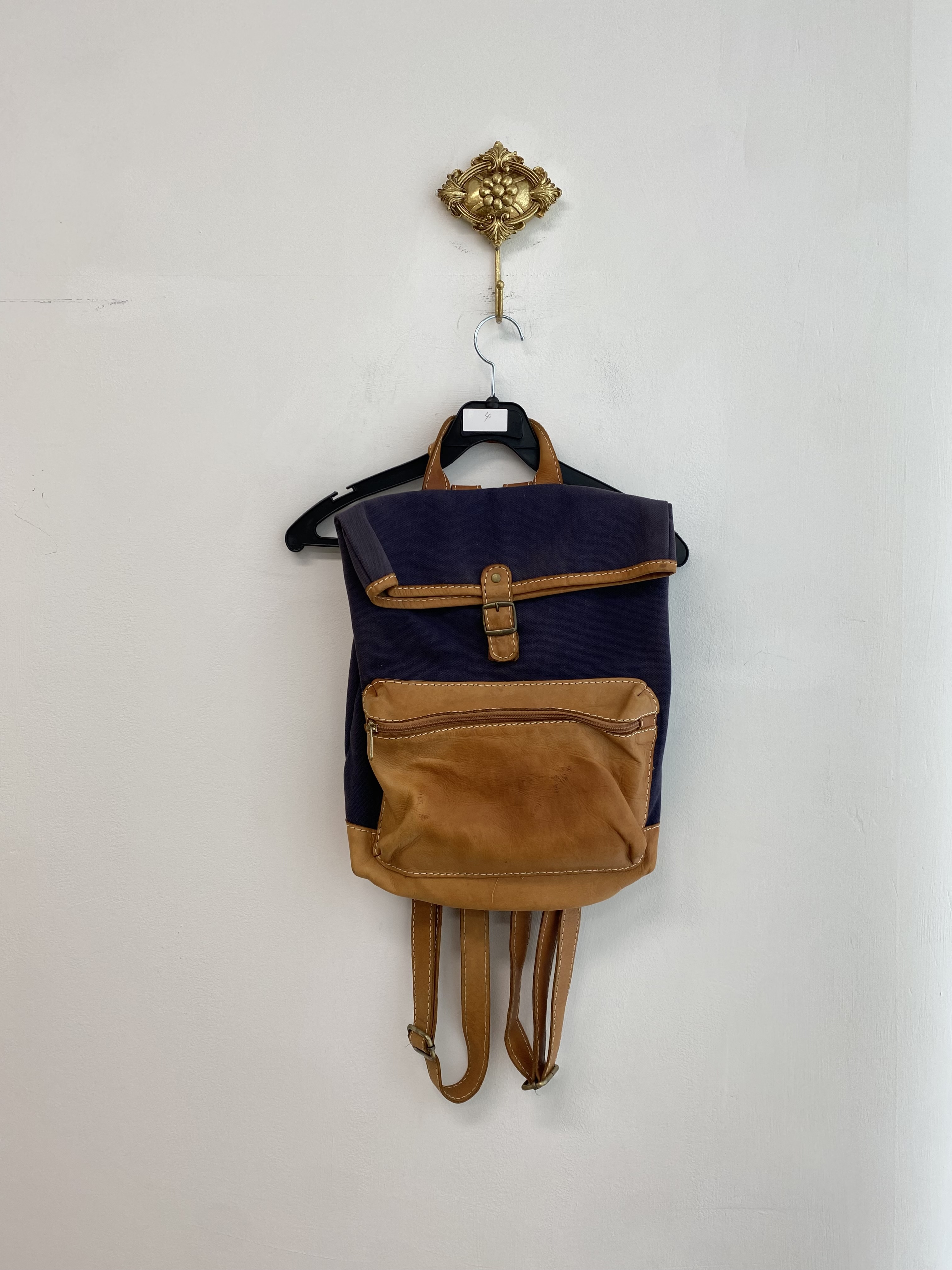 Navy cotton leather mix pocket backpack